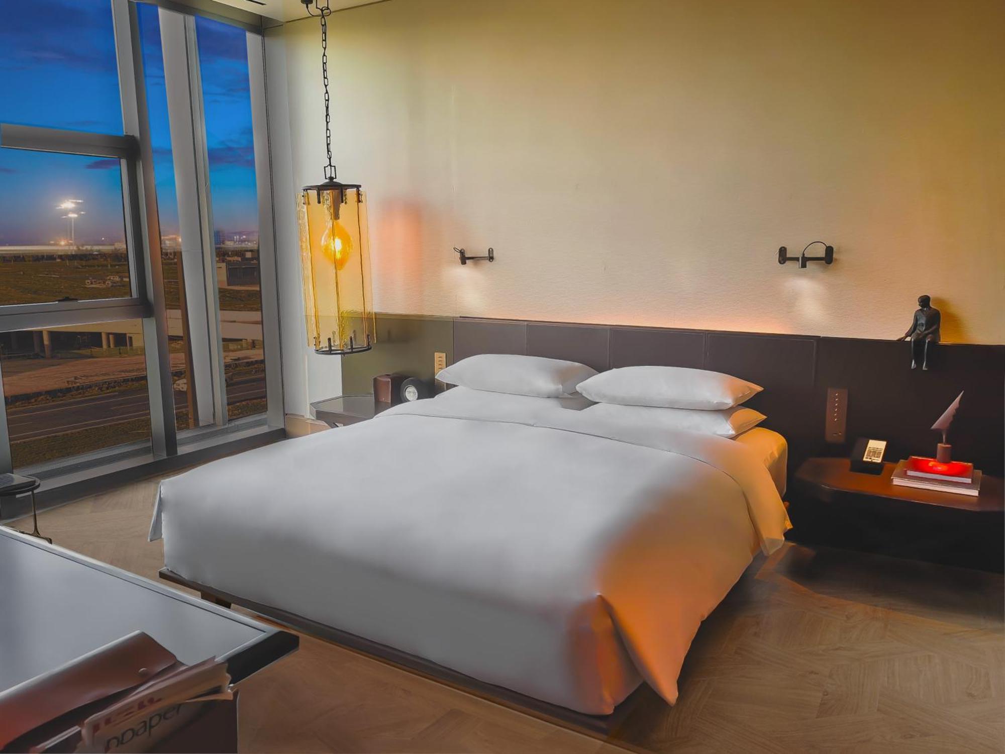 Mumian Beijing Daxing International Airport, Part Of Hyatt Hotell Exteriör bild A bedroom at the hotel